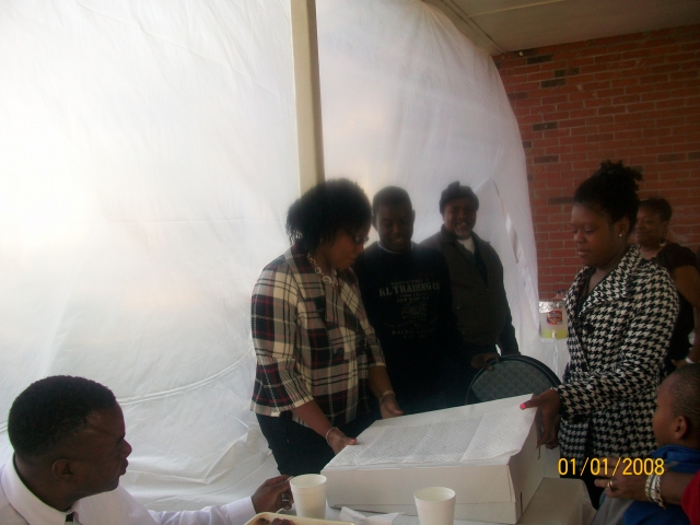 Rev. Rollins, Valerie Rollins, Calvin Rollins Jr. and Brittany Rollins